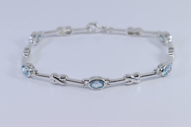 Brilliant Sterling Silver Blue Topaz Bracelet 7.5"